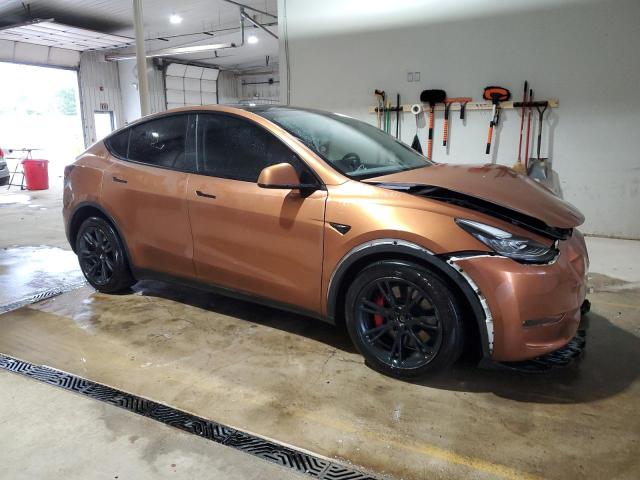 7SAYGDEE4PA099296 - 2023 TESLA MODEL Y Marrón foto 4