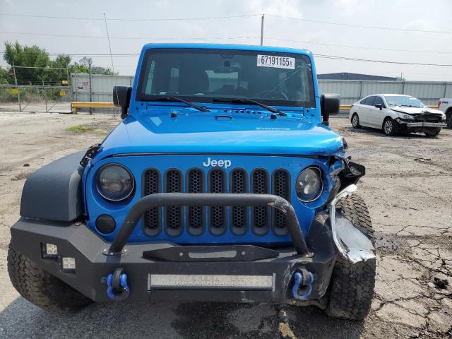1C4BJWDG4GL213364 - 2016 JEEP WRANGLER U SPORT Bleu photo 5