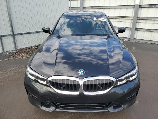 3MW5R7J09N8C72494 - 2022 BMW 330XI BLACK photo 5