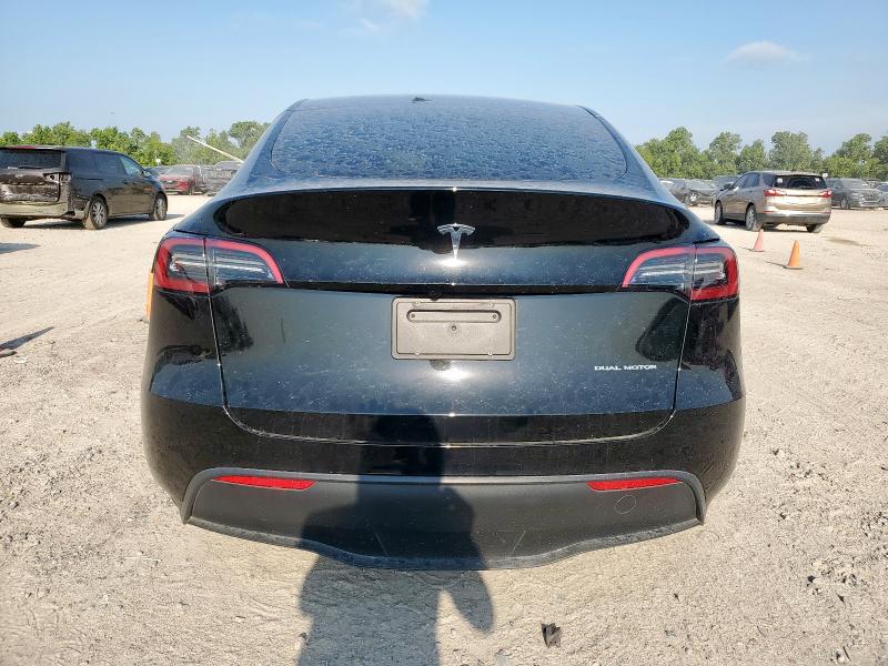 7SAYGAEE1RF192734 - 2024 TESLA MODEL Y Schwarz Foto 6