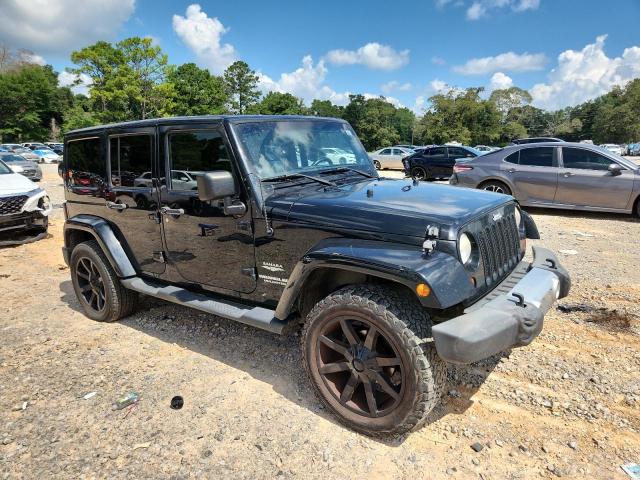 1J4BA5H15BL543100 - 2011 JEEP WRANGLER U SAHARA Սև լուսանկար 4