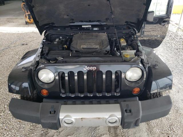 1C4HJWEG0DL607447 - 2013 JEEP WRANGLER UNLIMITED SAHARA BLACK photo 12