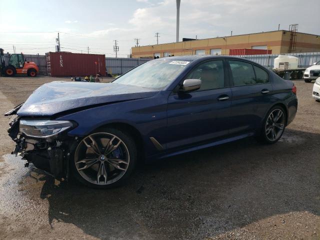 WBAJB9C51JB287037 - 2018 BMW M550XI BLUE photo 1