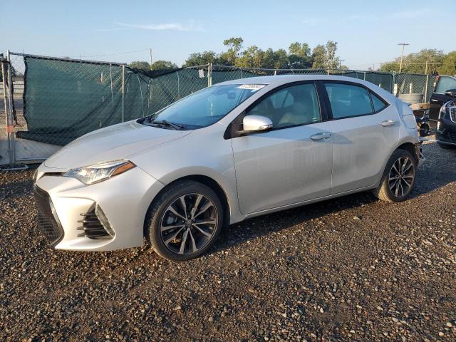 5YFBURHE0KP873497 - 2019 TOYOTA COROLLA L SILVER photo 1