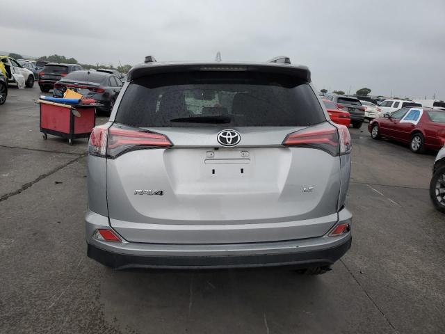 2T3ZFREV4JW522108 - 2018 TOYOTA RAV4 LE SILVER photo 6