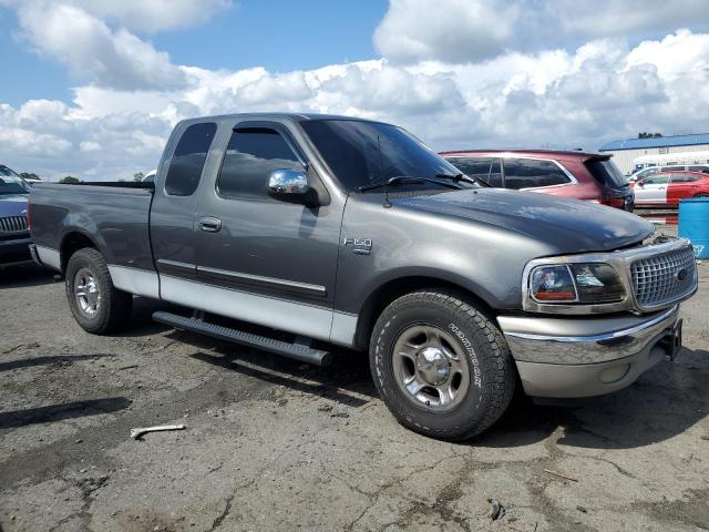 1FTRX17LX3NB27192 - 2003 FORD F150 4WD GRAY photo 4