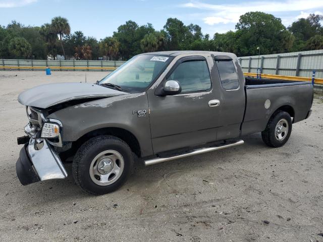 1FTZX1765WNA45742 - 1998 FORD F150 GRAY photo 1