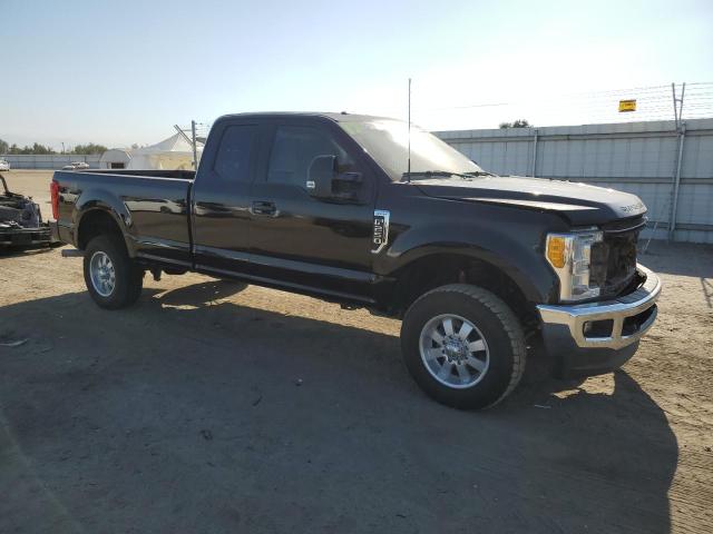 1FT7X2B63HEC96959 - 2017 FORD F250 SUPER DUTY BLACK photo 4