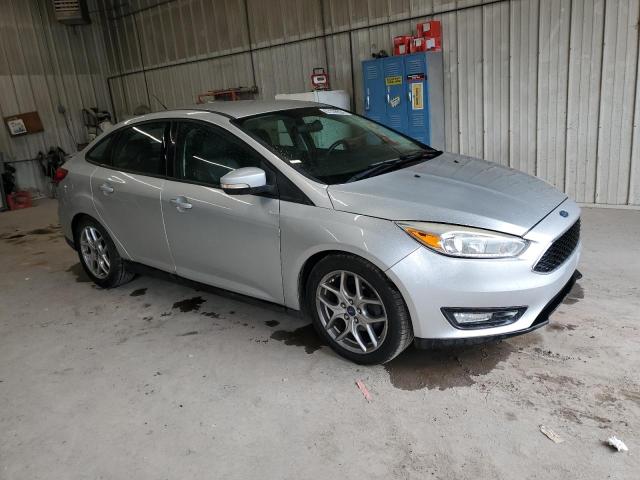 1FADP3F24FL234288 - 2015 FORD FOCUS SE SILVER photo 4