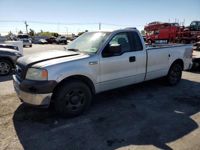 1FTRF12W05NB63044 - 2005 FORD F150 Argent photo 1