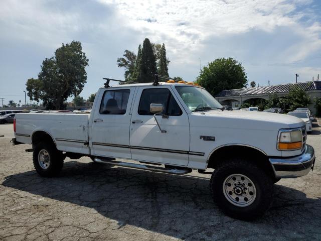 1FTJW36G4SEA80689 - 1995 FORD F350 WHITE photo 4