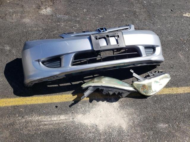 2HGES16354H594966 - 2004 HONDA CIVIC DX VP SILVER photo 12