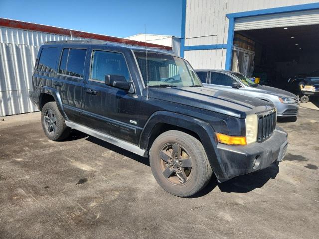 1J8HH48K76C269525 - 2006 JEEP COMMANDER BLACK photo 4