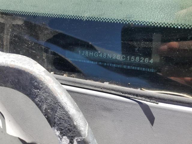 1J8HG48N26C158264 - 2006 JEEP COMMANDER BLACK photo 13