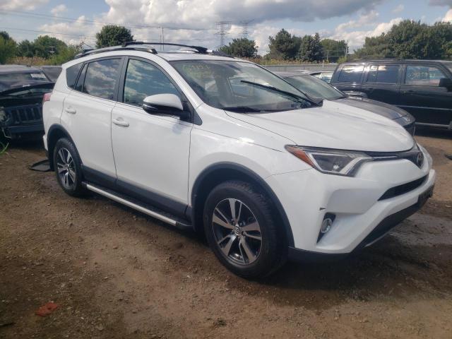 JTMRFREV6HD217961 - 2017 TOYOTA RAV4 XLE WHITE photo 4