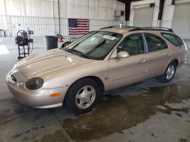 1FAFP58S2XG202905 - 1999 FORD TAURUS SE COMFORT TAN photo 1