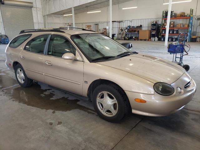 1FAFP58S2XG202905 - 1999 FORD TAURUS SE COMFORT TAN photo 4