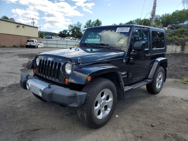 1J4GA5D15AL186088 - 2010 JEEP WRANGLER SAHARA BLACK photo 1