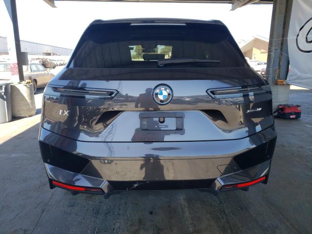 WB523CF06SCS49652 - 2025 BMW IX XDRIVE50 BLACK photo 6