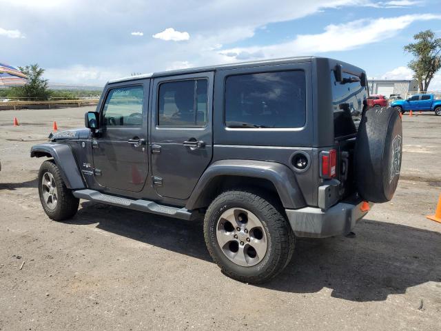 1C4HJWEG7JL926985 - 2018 JEEP WRANGLER U SAHARA Graphit Foto 2