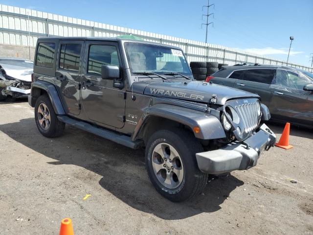 1C4HJWEG7JL926985 - 2018 JEEP WRANGLER U SAHARA Graphit Foto 4