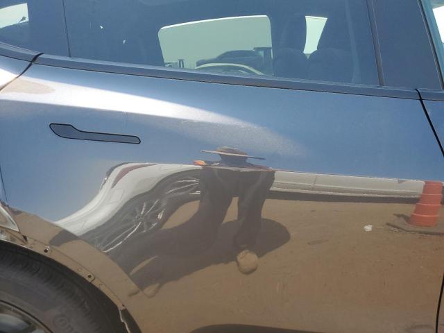 7SAYGDEE6TF360859 - 2026 TESLA MODEL Y BLACK photo 11