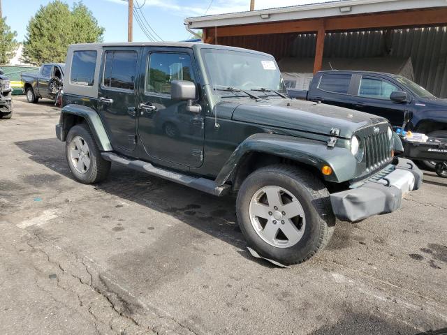 1J4HA5H19AL140181 - 2010 JEEP WRANGLER U SAHARA GREEN photo 4