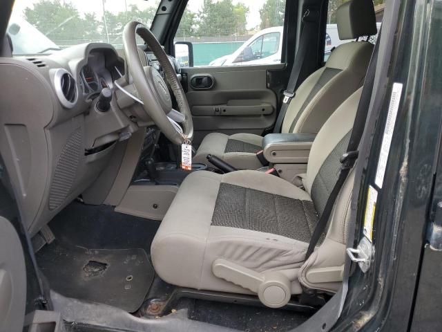 1J4HA5H19AL140181 - 2010 JEEP WRANGLER U SAHARA GREEN photo 7