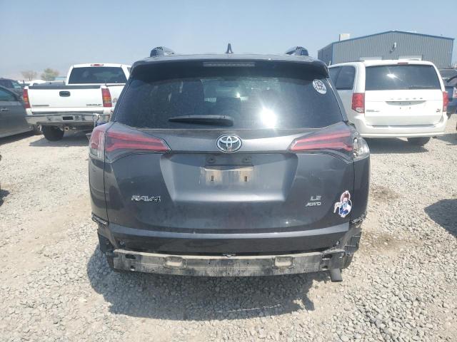 JTMBFREV6JJ727302 - 2018 TOYOTA RAV4 LE Gris photo 6