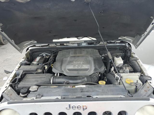 1C4BJWEG5CL279141 - 2012 JEEP WRANGLER UNLIMITED SAHARA SILVER photo 11