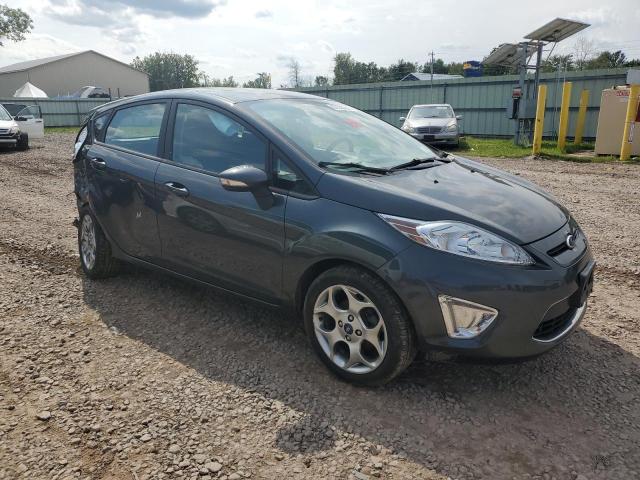 3FADP4FJ7BM111073 - 2011 FORD FIESTA SES CHARCOAL photo 4