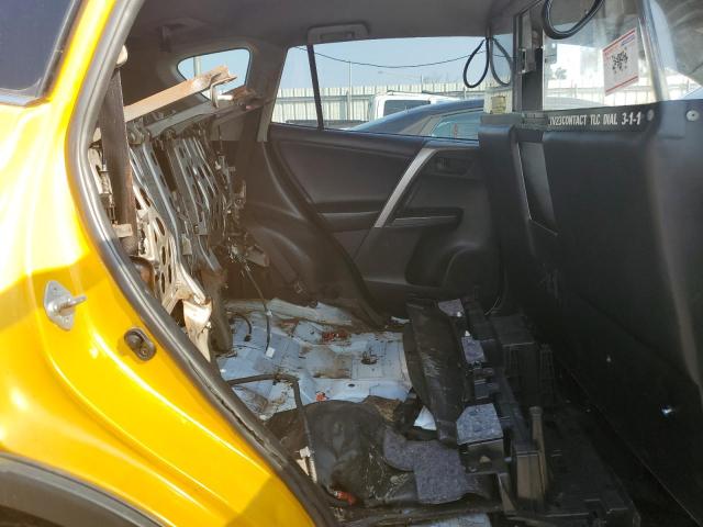 JTMRJREVXJD192941 - 2018 TOYOTA RAV4 HV LE Jaune photo 10