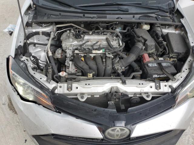 5YFBURHEXJP846001 - 2018 TOYOTA COROLLA L SILVER photo 11