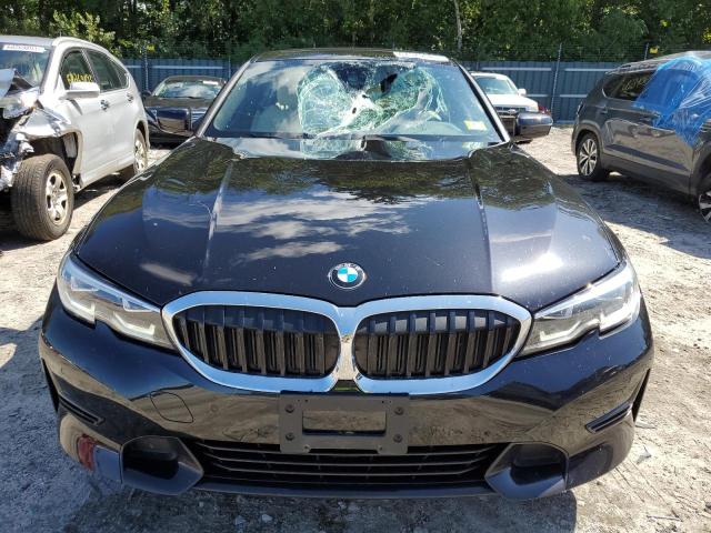 3MW5R7J0XM8C20130 - 2021 BMW 330XI BLACK photo 5