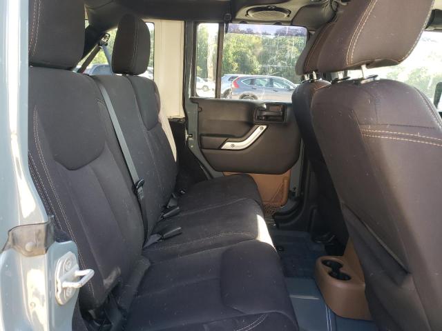 1C4BJWEG7EL146402 - 2014 JEEP WRANGLER U SAHARA BLUE photo 10