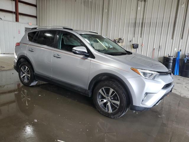 2T3RFREV6GW512009 - 2016 TOYOTA RAV4 XLE SILVER photo 4