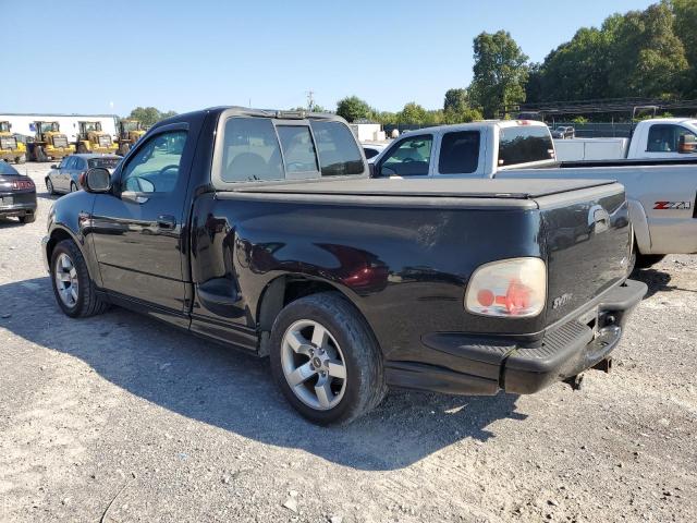 2FTZF07361CA46898 - 2001 FORD F150 SVT LIGHTNING BLACK photo 2