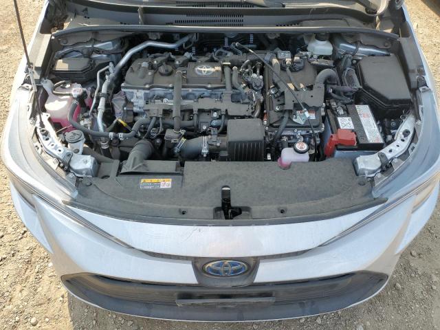 JTDBDMHE8RJ010142 - 2024 TOYOTA COROLLA LE SILVER photo 11