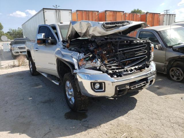 1GT12TEY1HF249091 - 2017 GMC SIERRA K2500 SLT SILVER photo 4