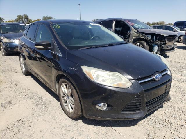 1FAHP3M28CL156615 - 2012 FORD FOCUS SEL BLACK photo 4