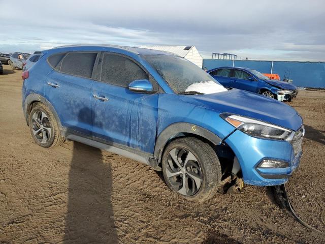 KM8J3CA28JU688736 - 2018 HYUNDAI TUCSON VALUE BLUE photo 4