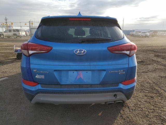 KM8J3CA28JU688736 - 2018 HYUNDAI TUCSON VALUE BLUE photo 6