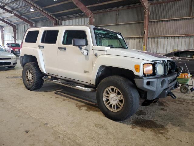 5GTDN13E878158932 - 2007 HUMMER H3 WHITE photo 4