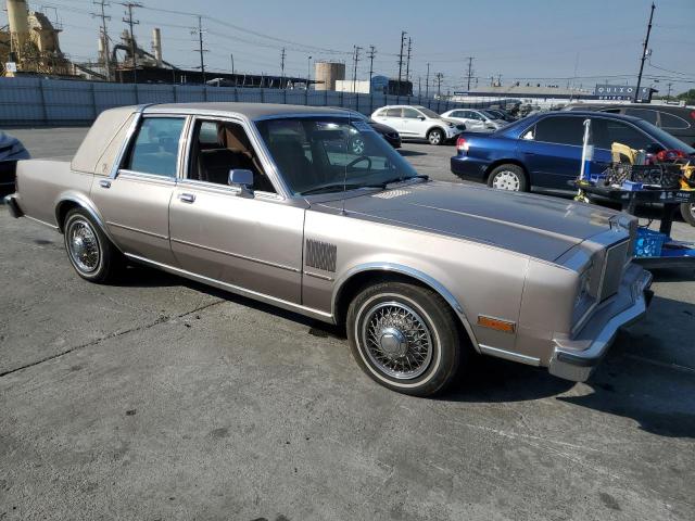 1C3BF66P4JW112124 - 1988 CHRYSLER FIFTH AVENUE TAN photo 4