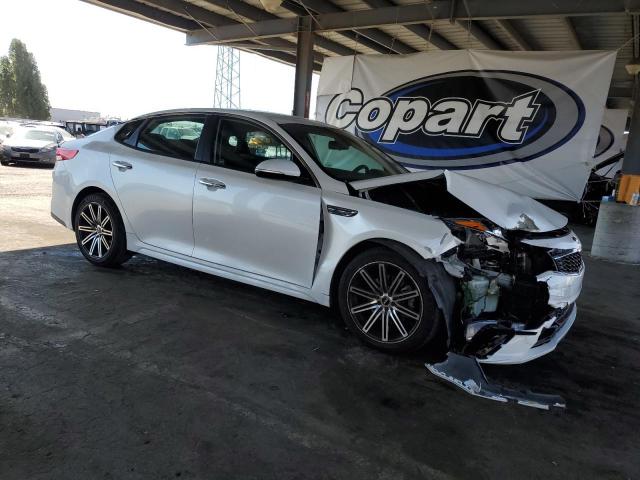 5XXGT4L33KG336990 - 2019 KIA OPTIMA LX WHITE photo 4