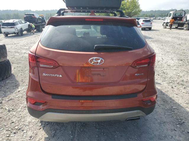 5XYZU3LB6HG464426 - 2017 HYUNDAI SANTA FE S ORANGE photo 6
