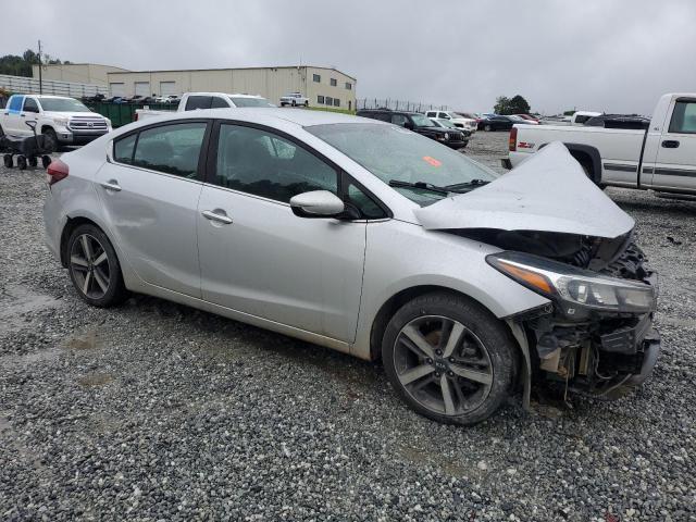 3KPFL4A81HE128960 - 2017 KIA FORTE EX SILVER photo 4
