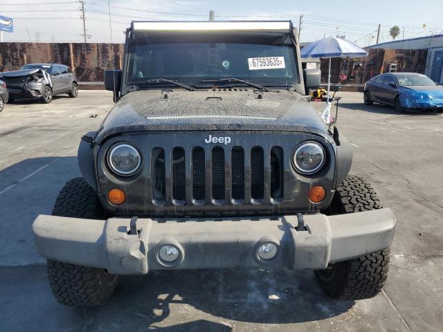 1C4HJWDG5DL546775 - 2013 JEEP WRANGLER UNLIMITED SPORT Чорний фото 5