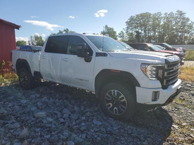 1GT49VE71PF229112 - 2023 GMC SIERRA K3500 AT4 WHITE photo 4