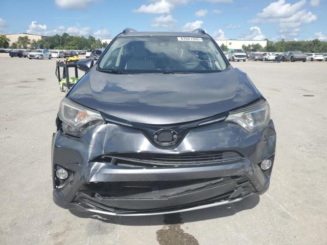JTMRJREV6JD221027 - 2018 TOYOTA RAV4 HV LE ნაცრისფერი ფოტო 5
